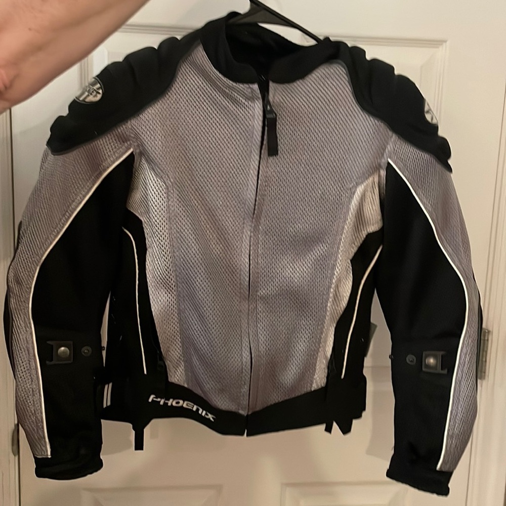 Women’s Small Joe Rocket Rider jacket with pads and Rash guard.
